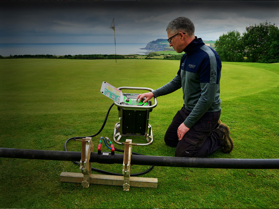 Technician inspecting field equipment and asset condition